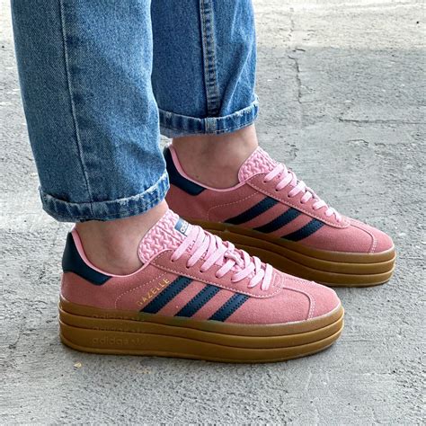 pink glow adidas gazelle.